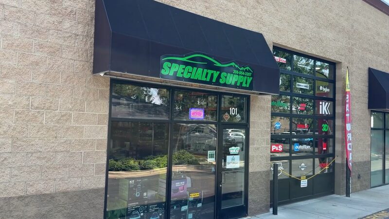 Front door of the Specialty Supply store on E Pine Ave
